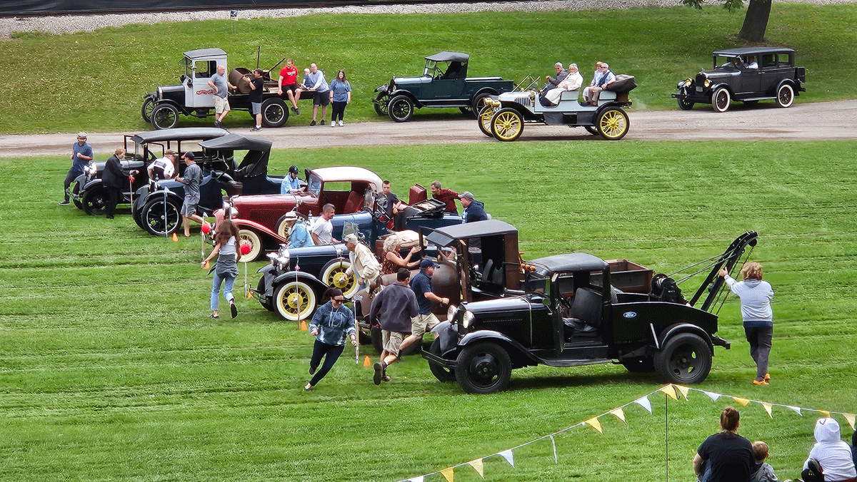 Passengers scrambled during a “fire drill” competition on the Walnut Grove activity field.