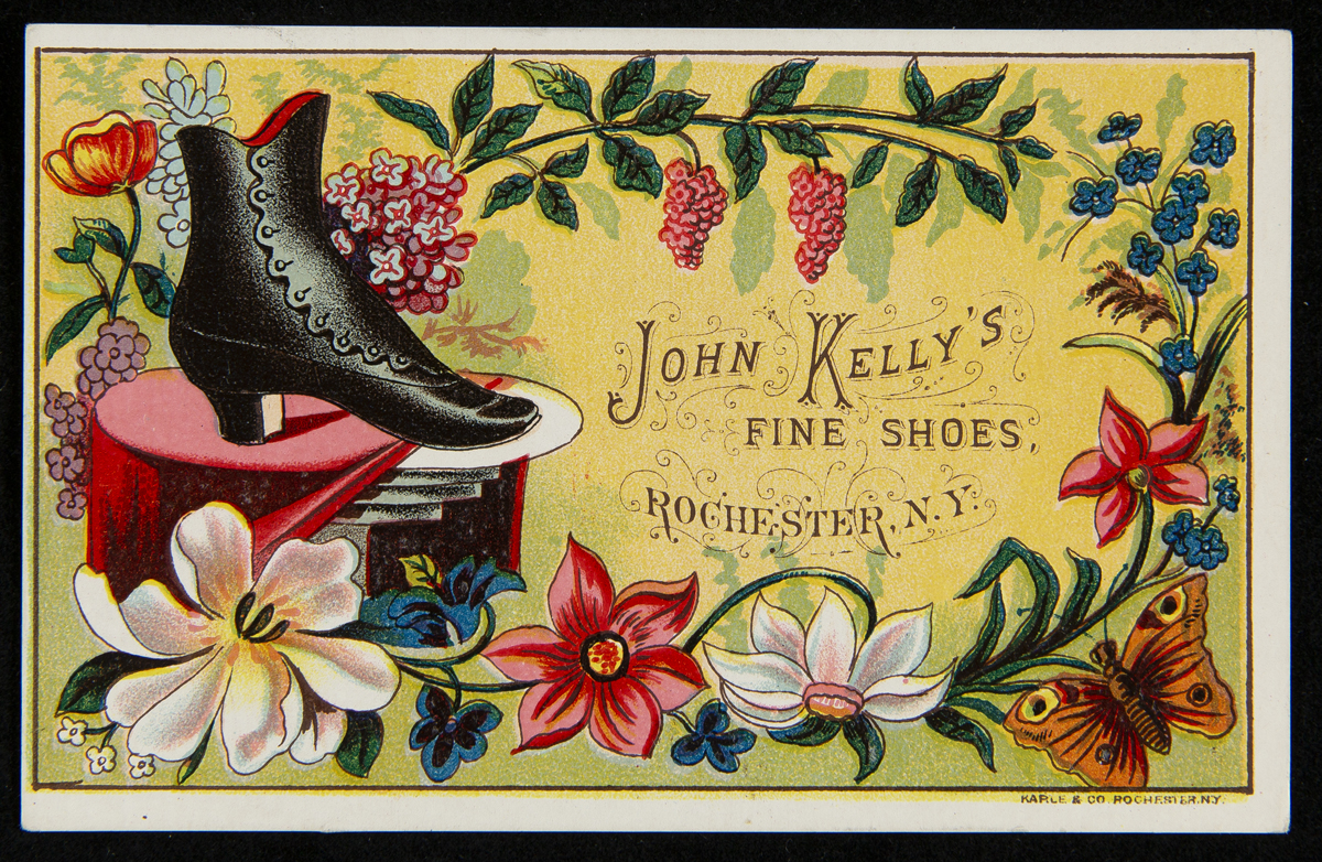 Trade Card for John Kelly's Fine Shoes, 1879-1890 Yellow card with drawing of black lace-up shoe and flowers around edge of card; text in middle