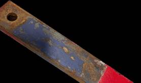 Harvester blue paint color Wooden board with gray-blue and red paint on it
