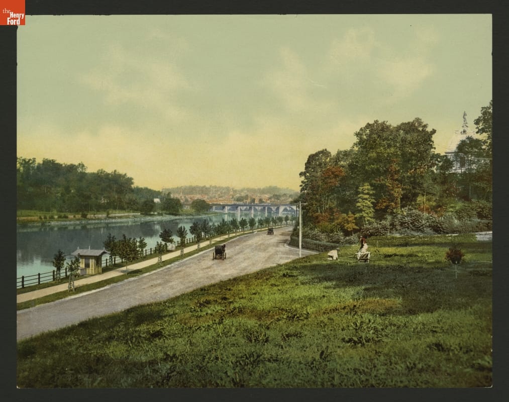Photochrom, "River Drive from Laurel Hill, Fairmount Park, Philadelphia, Pennsylvania," 1900 Dirt road along a river, with open lawn and trees on either side