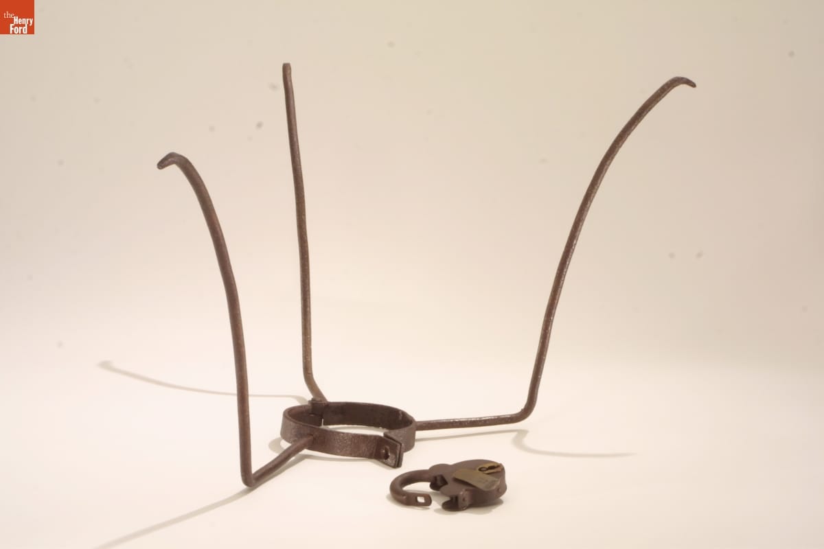 Slave Collar, circa 1860 Collar with three tall prongs extending upward and heavy lock.