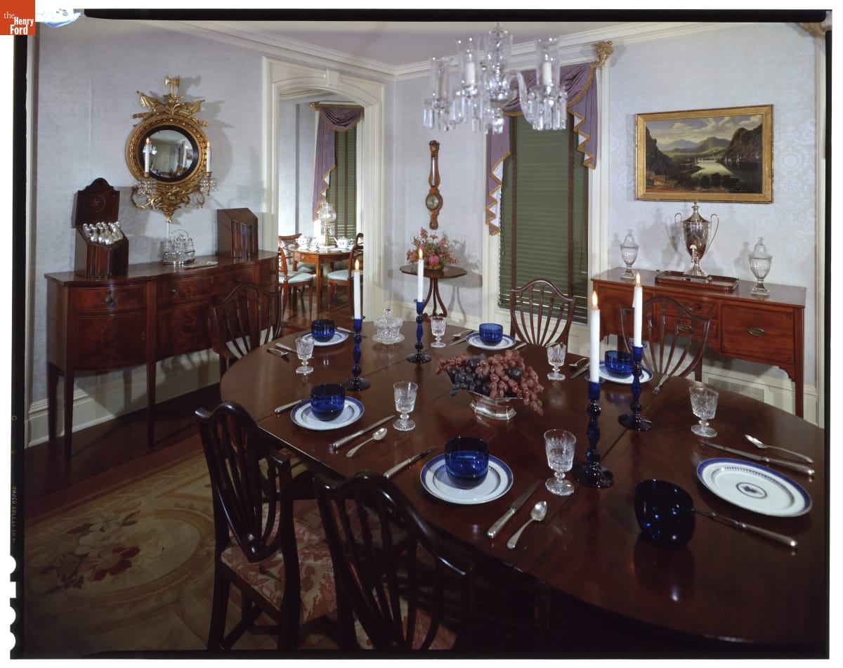 Dining Room in Noah Webster Home in Greenfield Village, 1963 Dining room with elaborate furnishings, including set table and chairs and two sideboards