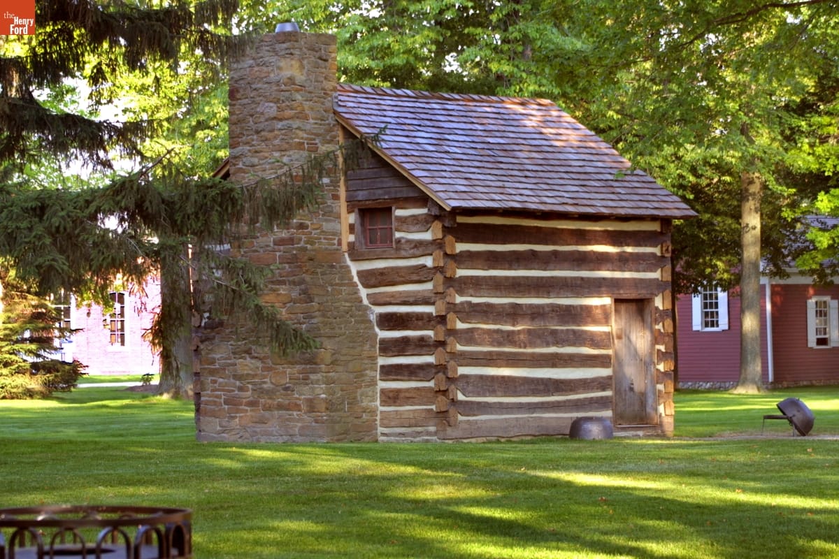 William Holmes McGuffey Birthplace Small log cabin with stone fireplace