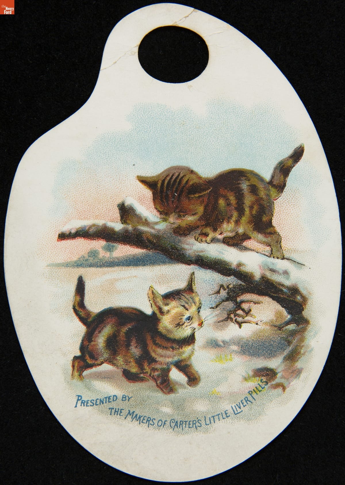 Palette-shaped paper containing illustrations of two kittens cavorting in snow