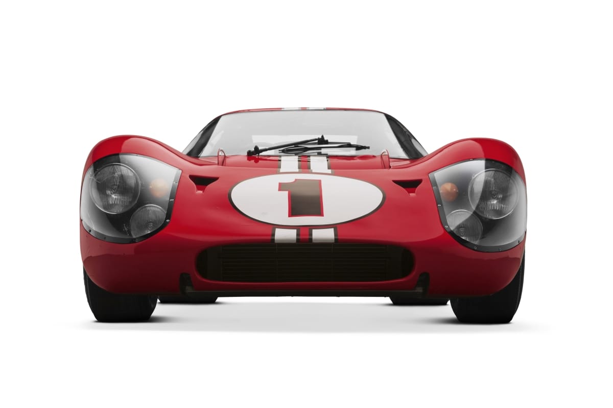1967 Ford Mark IV Race Car Head-on view of a low red race car with large number "1" in circle on hood